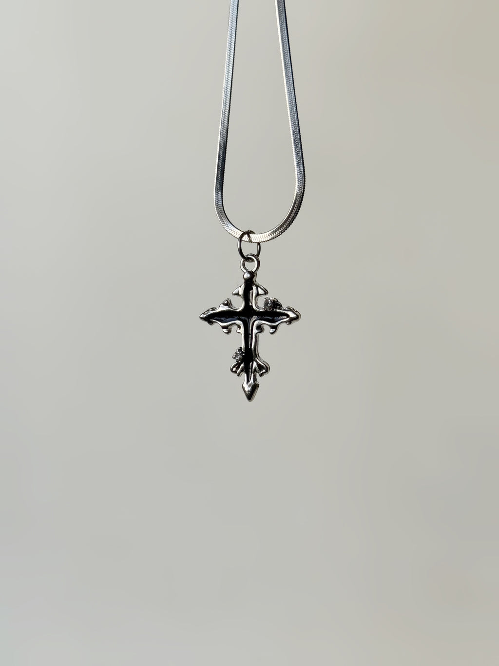 Silver toned black wax