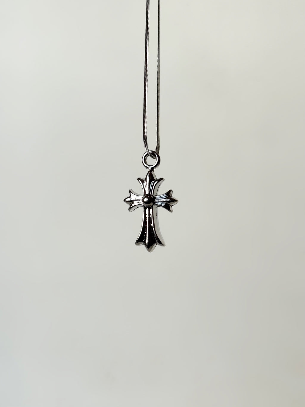 Chrome heart cross pendant