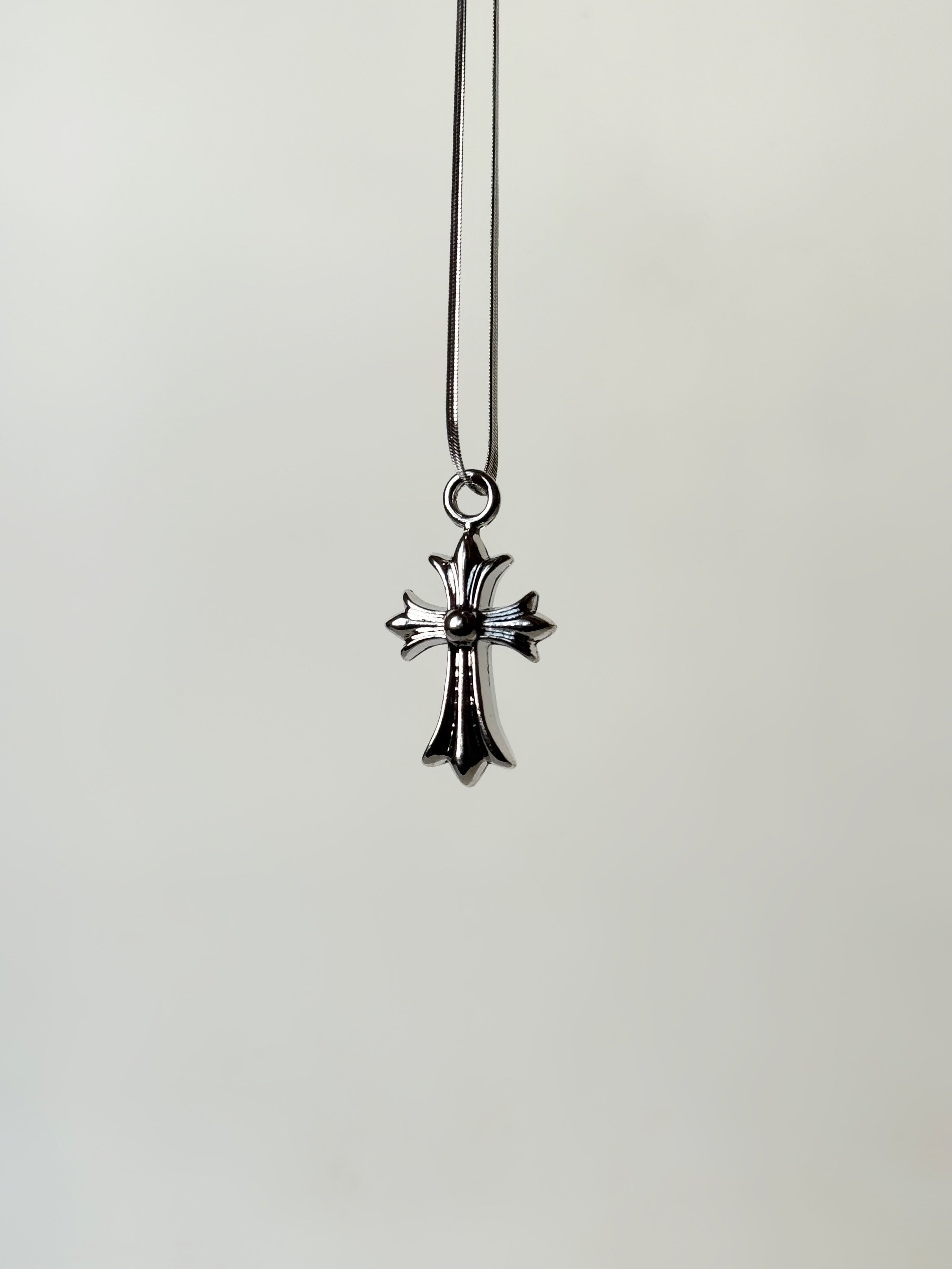 Chrome heart cross pendant