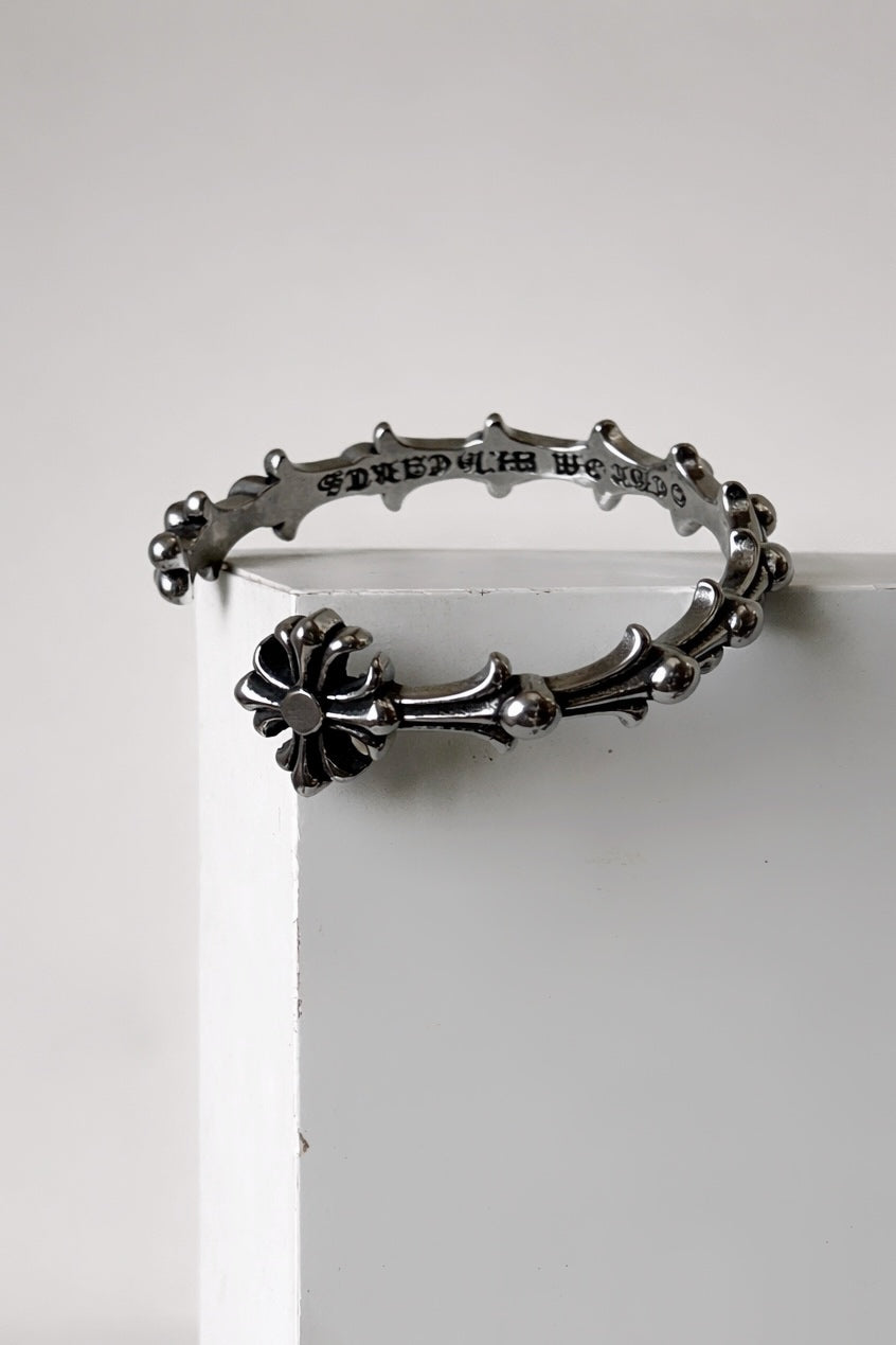 Chrome baby fat cross fleur