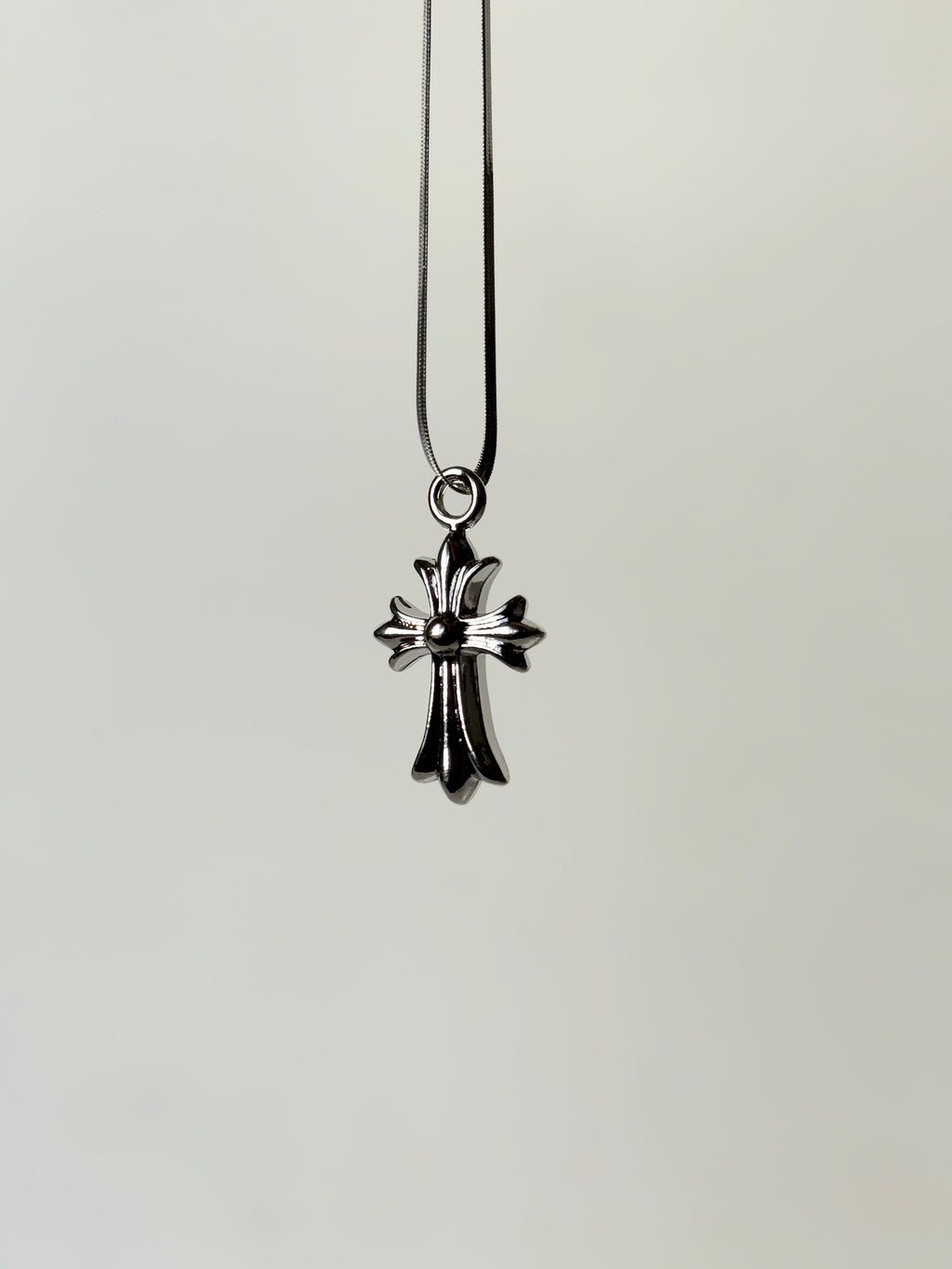 Chrome heart cross pendant