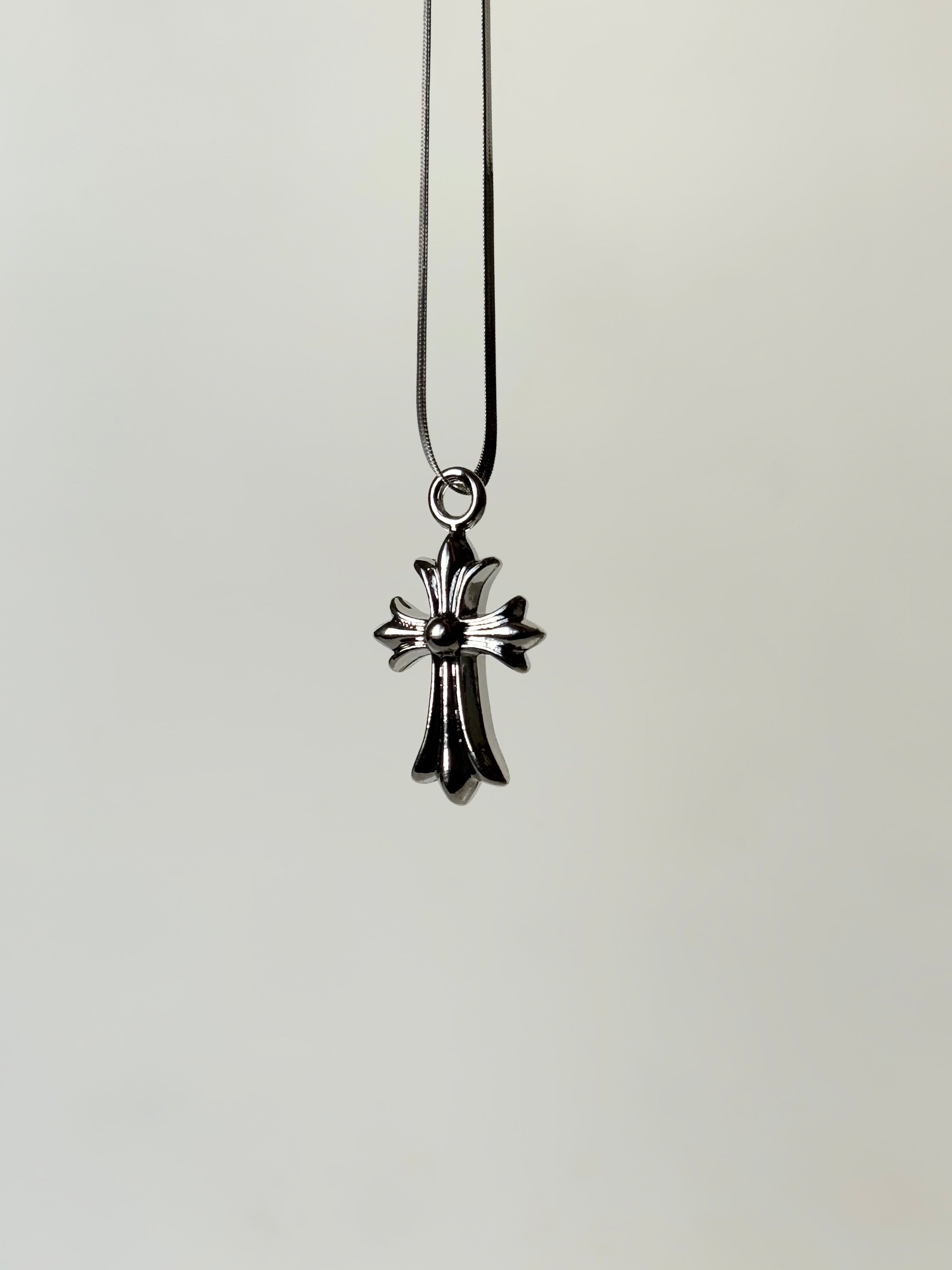 Chrome heart cross pendant