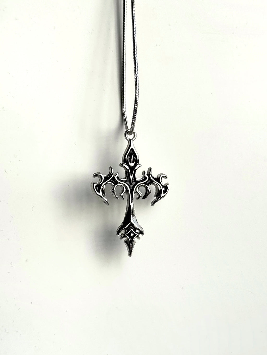 Flame gothic cross pendant